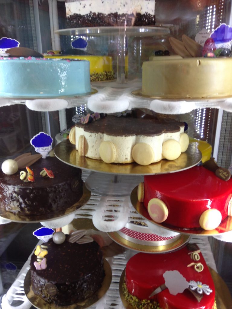 Luscious looking cakes in an Italian bakery are not causing obesity.